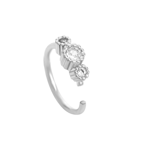 Detail of silver C-shaped nose ring featuring three sparkling clear floral zircons