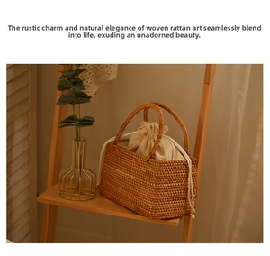 Detail of handmade wicker basket bag with drawstring liner on a wooden shelf