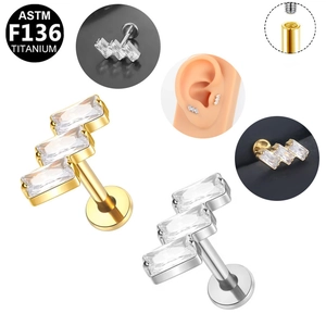 Detail of G23 titanium labret stud with triple rectangular zircons and flat back structure