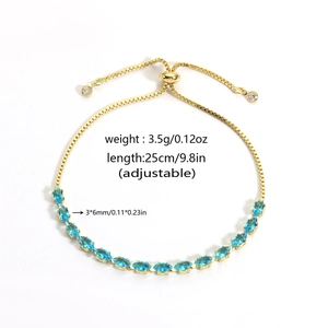 Detail of adjustable gold tennis bracelet with marquise blue zircon and dimension specs