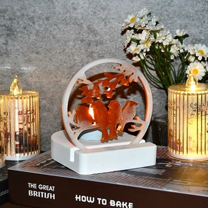 Macro detail of LED bird resin night light on square base with cozy home decor
