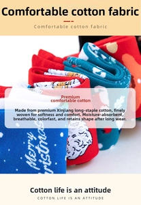 Close-up of colorful Christmas cotton socks with Merry Christmas text and polka dots