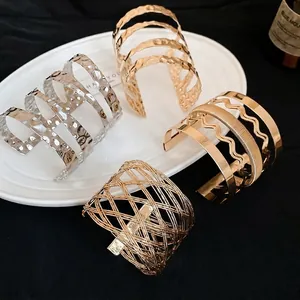 Metallic pleated hollow wave layered bracelet in gold and silver finish for women