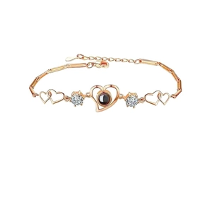 Golden heart projection bracelet with crystal stones and interlocking heart link chain