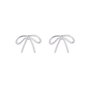 Minimalist silver bow knot stud earrings with polished metallic finish on white background