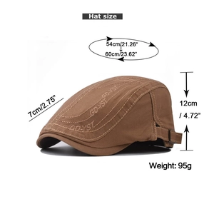 Detail view of brown cotton flat cap showing GDYST embroidery and size measurements