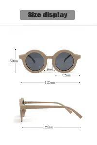 Detailed dimension guide for kids round sunglasses with frame measurements and UV400 label