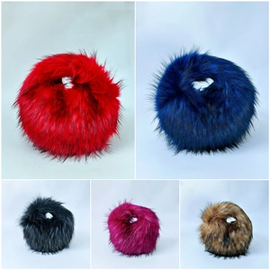 Close-up of fluffy faux fur handbag in red, blue, black, rose, and brown colors
