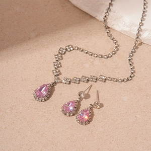 Detail of luxury teardrop pink zircon jewelry set with necklace and earrings