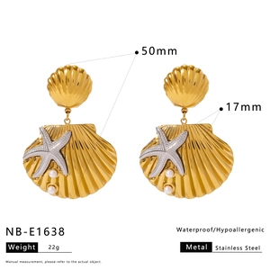 Detail view of gold shell earrings with starfish and pearls including 50mm size dimensions