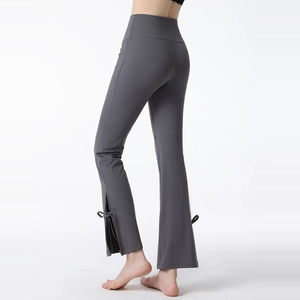 High waist crossover flared yoga pants with side slits and bow tie knots in dark grey