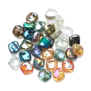 Pile of 12mm iridescent colorful glass square beads with center holes for DIY crafts