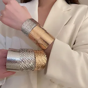Irregular geometric textured metal bangle bracelet with gold and silver finish plating
