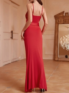 Elegant red sequin slit evening gown with spaghetti straps and floor-length silhouette