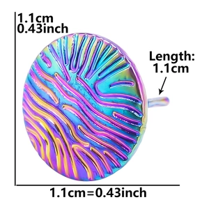 Macro shot of rainbow stainless steel round stud earrings showing 1.1cm diameter measurement