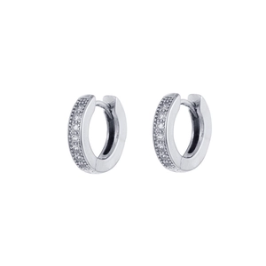 Macro shot of silver zircon pavé hoop earrings with high-grade minimalist design