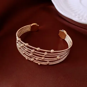 Retro multilayer beaded open bangle in gold finish with textured metal chains and beads