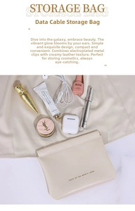 Macro shot of cream leather pouch with metal spring closure and luxury cosmetic props