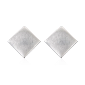 Detail shot of silver square stud earrings with a brushed metal texture and minimalist design