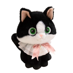 Cute black and white tuxedo cat plush toy with pink lace bow and green eyes on white