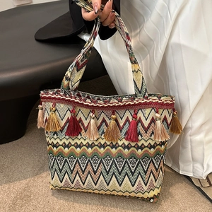 Bohemian large tote bag with colorful geometric patterns and decorative tassels