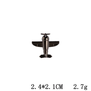 Macro shot of gunmetal aircraft engine brooch with 2.4*2.1cm dimensions detail