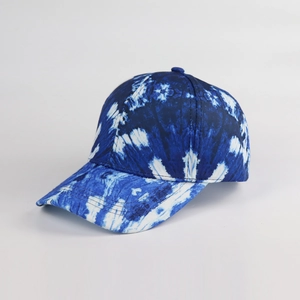 Detailed view of the blue and white tie-dye pattern on this stylish baseball cap fabric