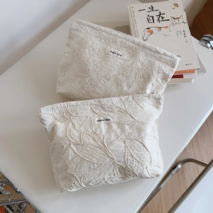 Minimalist cream floral embroidered makeup bag set with simple wish fabric label