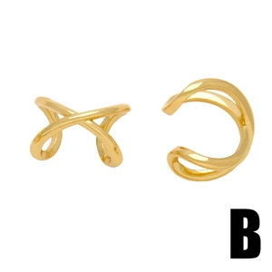Minimalist gold geometric cross ear cuff with polished finish and irregular X-shaped design