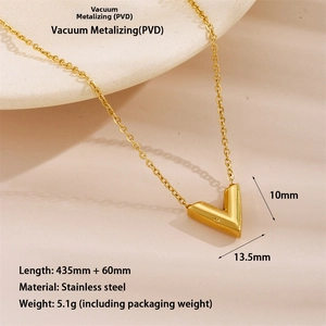 Close-up of gold V-shaped pendant necklace with polished stainless steel finish