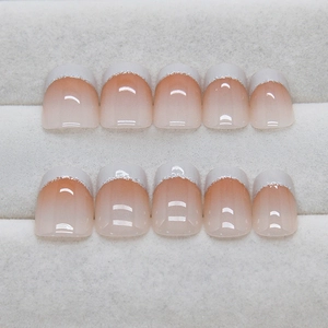 French gradient press-on nails in cream white and pink with silver glitter details