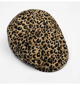 Top view of cotton leopard print flat cap showing classic pattern and textured fabric