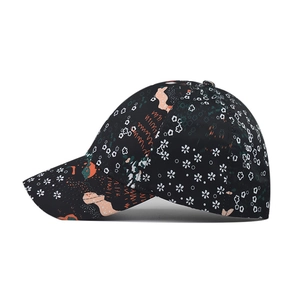 Unisex baseball cap featuring black fabric with white daisies and tie-dye abstract prints