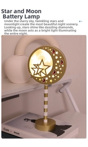 Macro shot of Star and Moon LED mood light with warm yellow glow and golden base