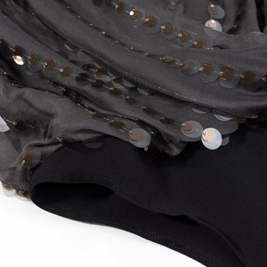 Deep grey sequin jumpsuit for women featuring a loose V-neck and metallic texture
