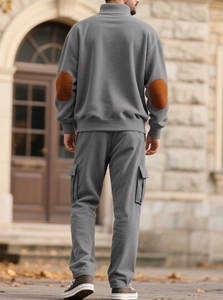 Men's grey corduroy tracksuit set featuring brown elbow patches and waffle texture
