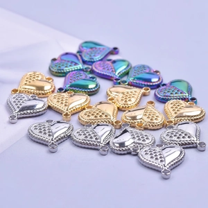 Golden and silver heart-shaped stainless steel pendants with honeycomb textured back