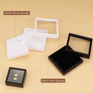 Clear acrylic jewelry display box with memory foam inserts in black and white colors