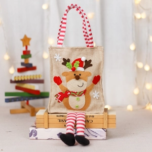 Christmas burlap gift bag with 3D reindeer design and festive red striped handles