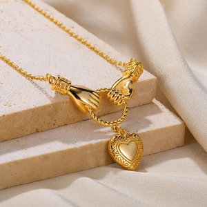 18K gold-plated necklace with a heart pendant and handshake design on beige stone