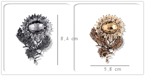 Detailed size view of sunflower brooches with crystal inlay measuring 8.4 cm by 5.8 cm