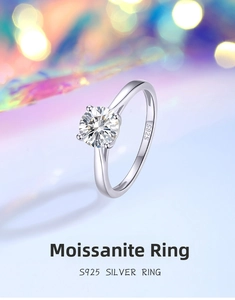 Macro side view of round Moissanite ring with S925 silver hallmark and four-prong setting
