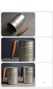 Detailed view of 304 stainless steel bamboo mug with a natural solid wood handle