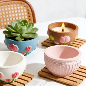 Detail showing colorful relief flower silicone molds used for plaster and candle making