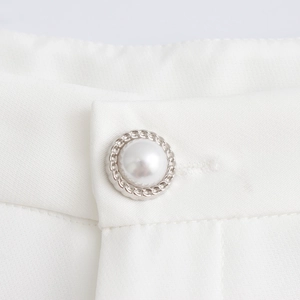 Elegant white commuter suit vest featuring decorative pearl buttons with silver metal trim