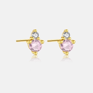 Detail of S925 silver stud earrings with pink gemstone and white zircon stones