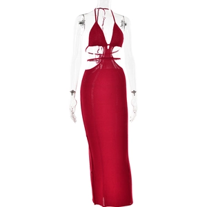 Detail of red knitted bodycon dress with sexy halter neck and cutout waist design