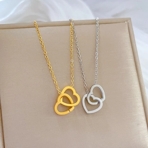 Minimalist titanium steel interlocking heart pendant necklace in gold and silver finish