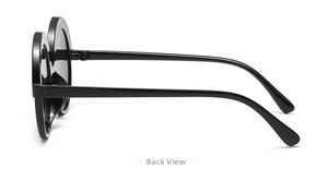 Side view of children's round black PC sunglasses featuring a unique double-circle frame