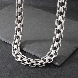 Detail of vintage 20mm chunky curb chain necklace in antique silver finish for men